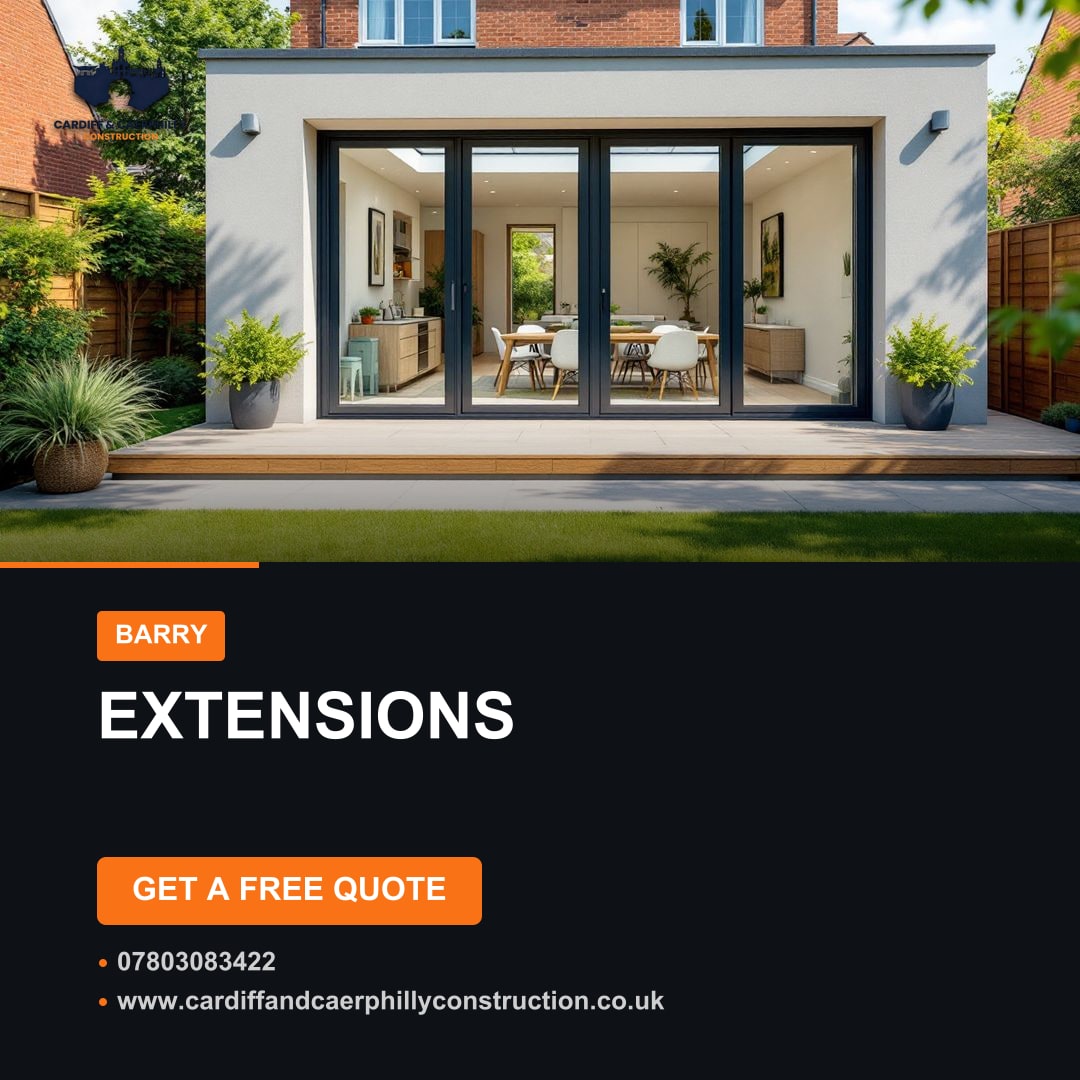 Modern house extension with large bi-fold doors, grey rendered walls, a wooden deck, and a green lawn.