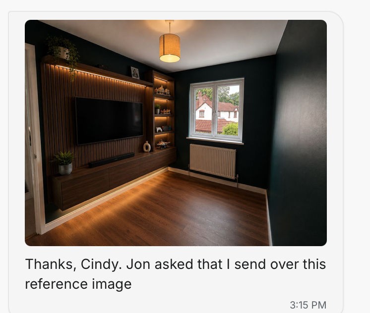 Modern living room with a bespoke dark wood media unit, integrated TV, illuminated shelving, and dark green painted walls.