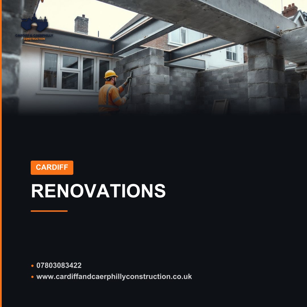 Construction worker building a block wall on a house extension project with steel beams for the roof structure.